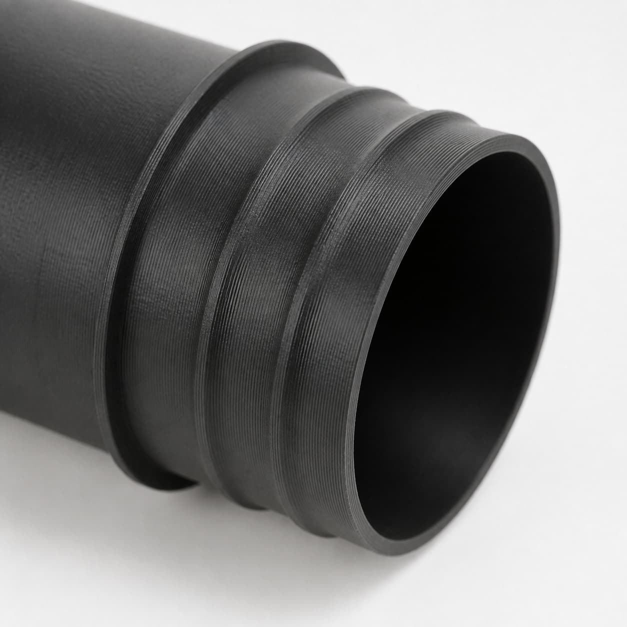 2-1/2 inch Corrugated Hose to 2-1/4 inch Smooth Duct Adapter, close view of the printed surface