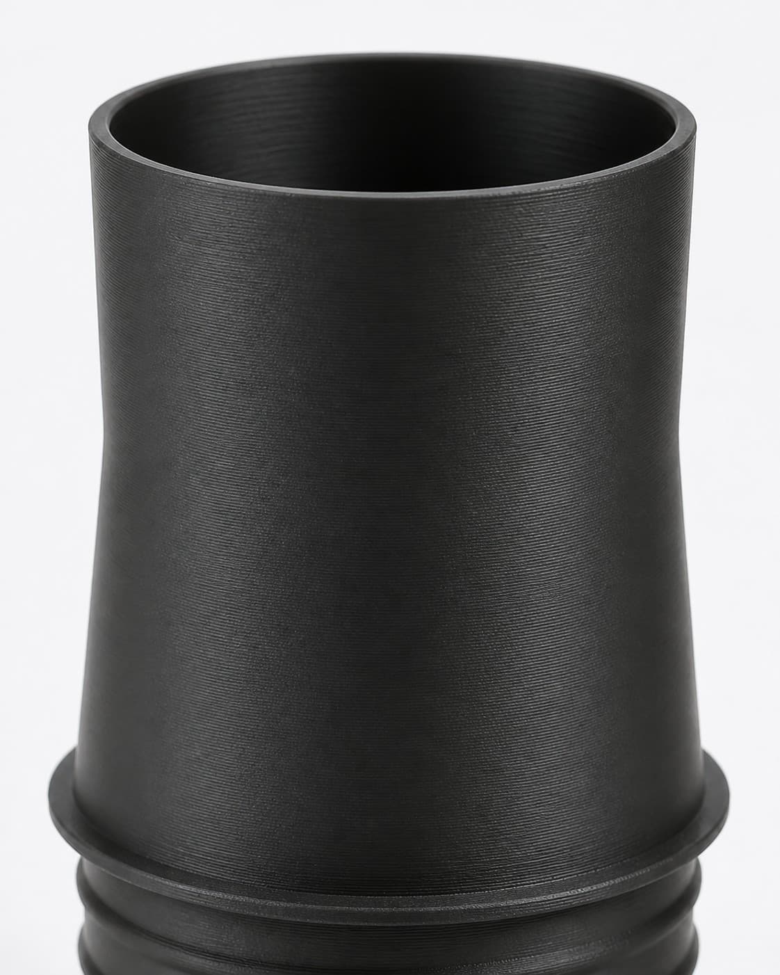 2-1/4 inch Corrugated Hose to 2 inch Smooth Duct Adapter, close view of the printed surface