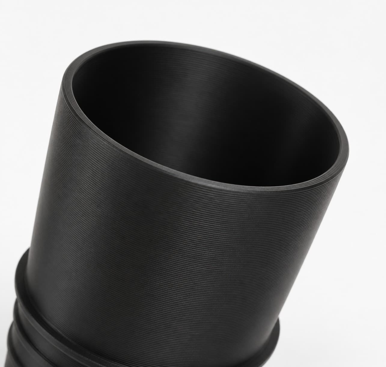 2-1/4 inch Corrugated Hose to 2-1/2 inch Smooth Duct Adapter, close view of the printed surface