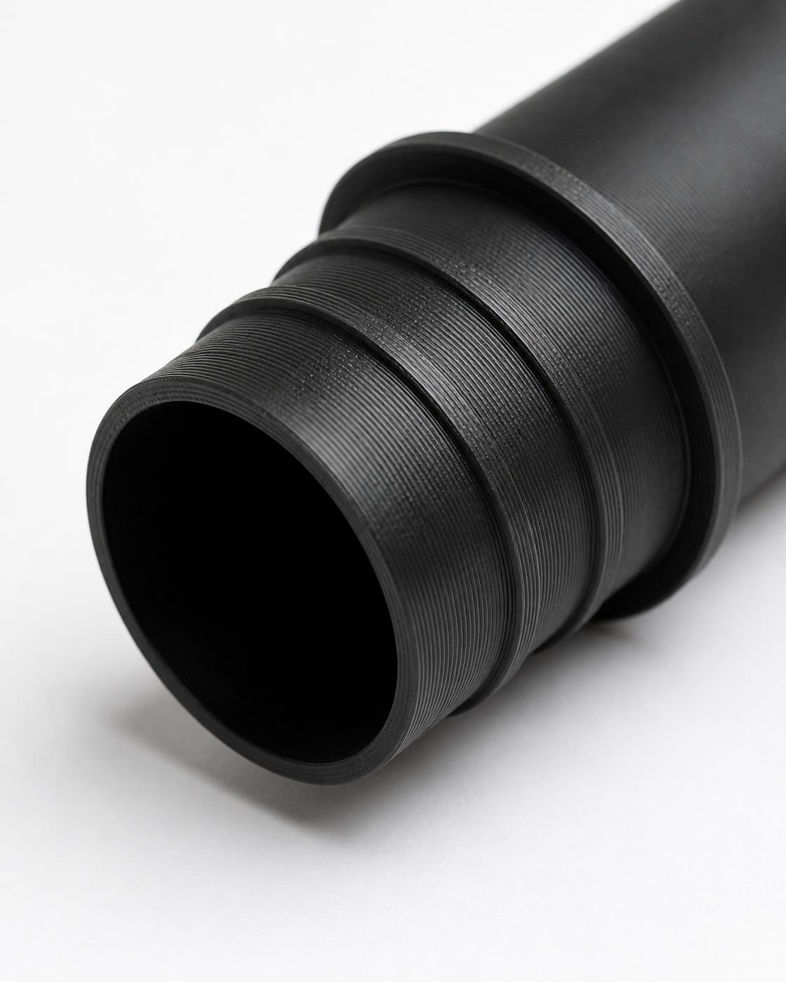 1-1/4 inch Wire Reinforced Hose to 1-1/2 inch Smooth Duct Adapter, close view of the printed surface