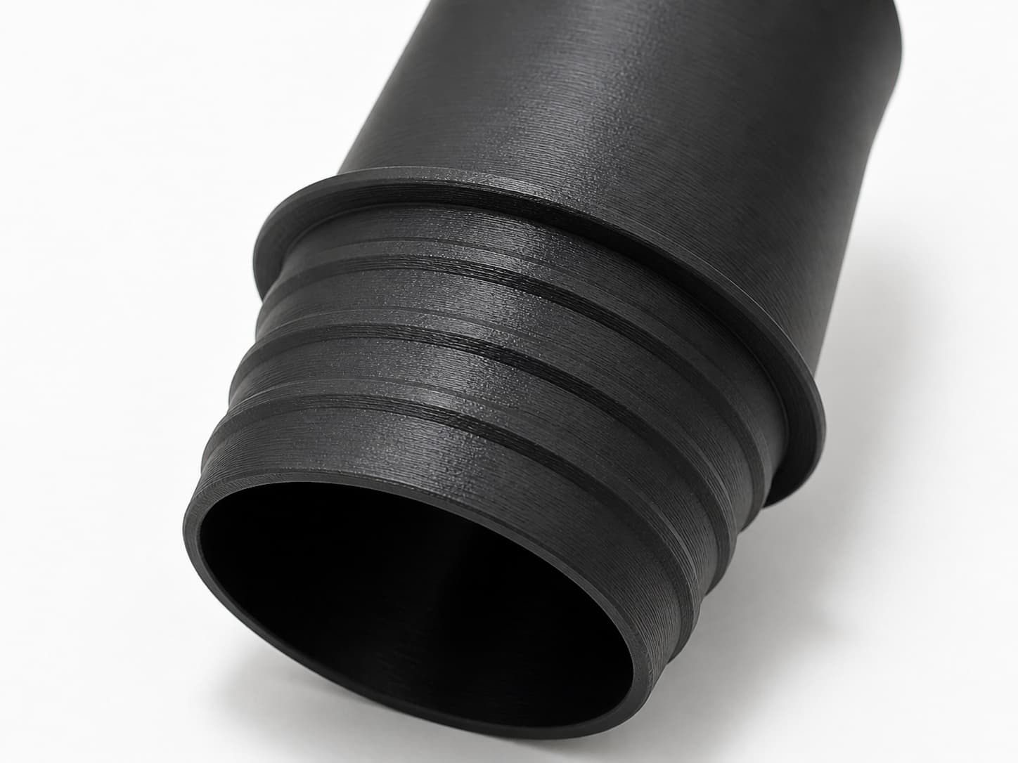 1-7/8 inch Wire Reinforced Hose to 1-1/2 inch Smooth Duct Adapter, close view of the printed surface