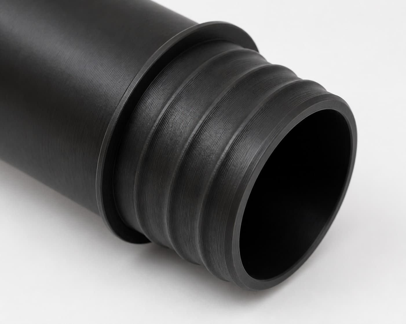 1-7/8 inch Wire Reinforced Hose to 1-7/8 inch Smooth Duct Adapter, close view of the printed surface