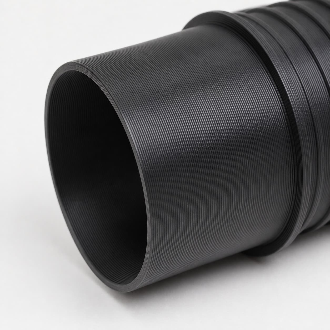 2-1/2 inch Wire Reinforced Hose to 2-1/4 inch Smooth Duct Adapter, close view of the printed surface