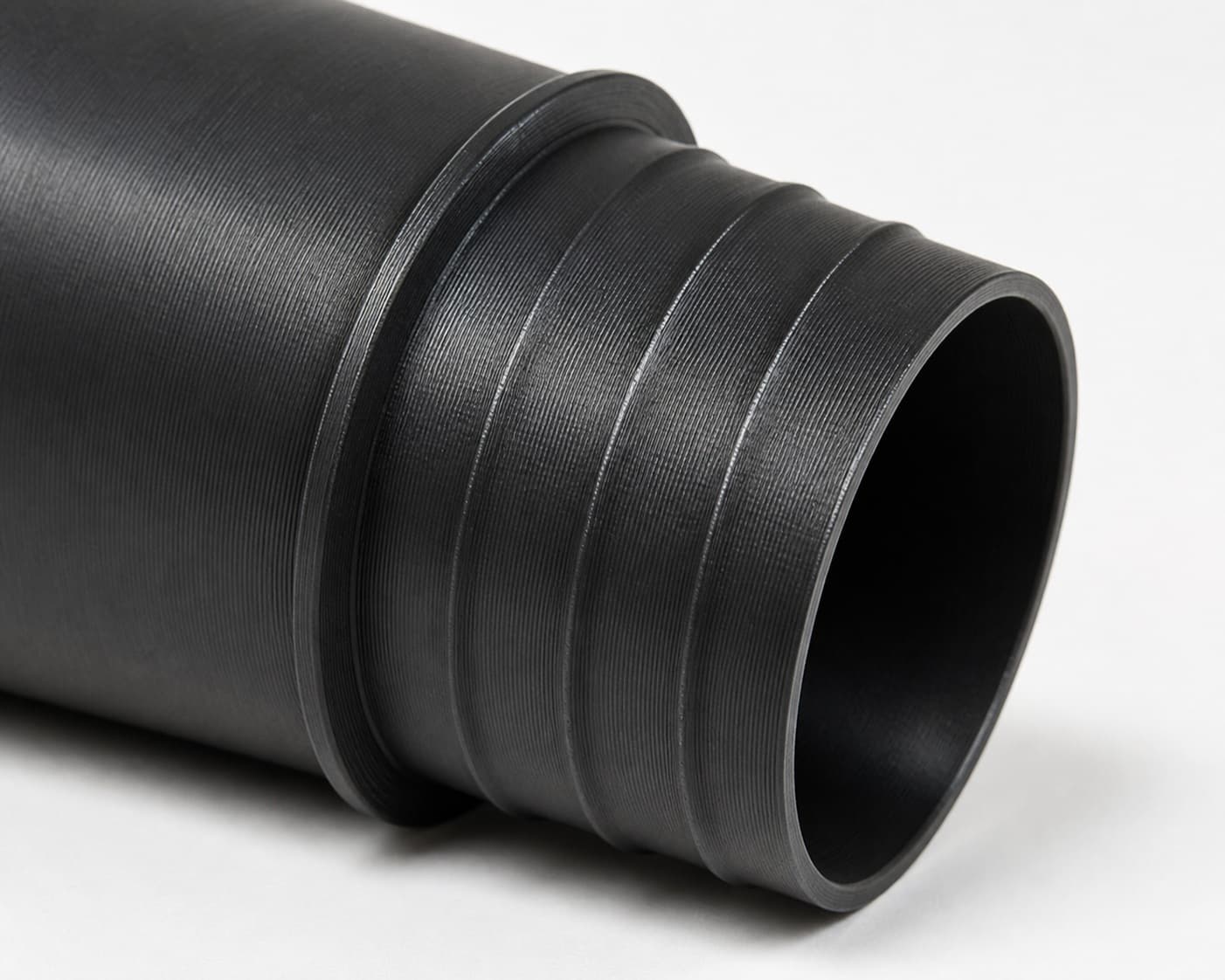 2-1/4 inch Wire Reinforced Hose to 2-1/2 inch Smooth Duct Adapter, close view of the printed surface