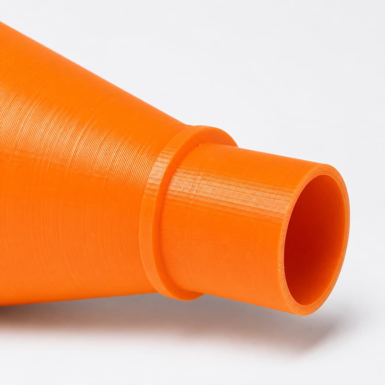 A close view of the dust adapter opening, about 47.6 mm across