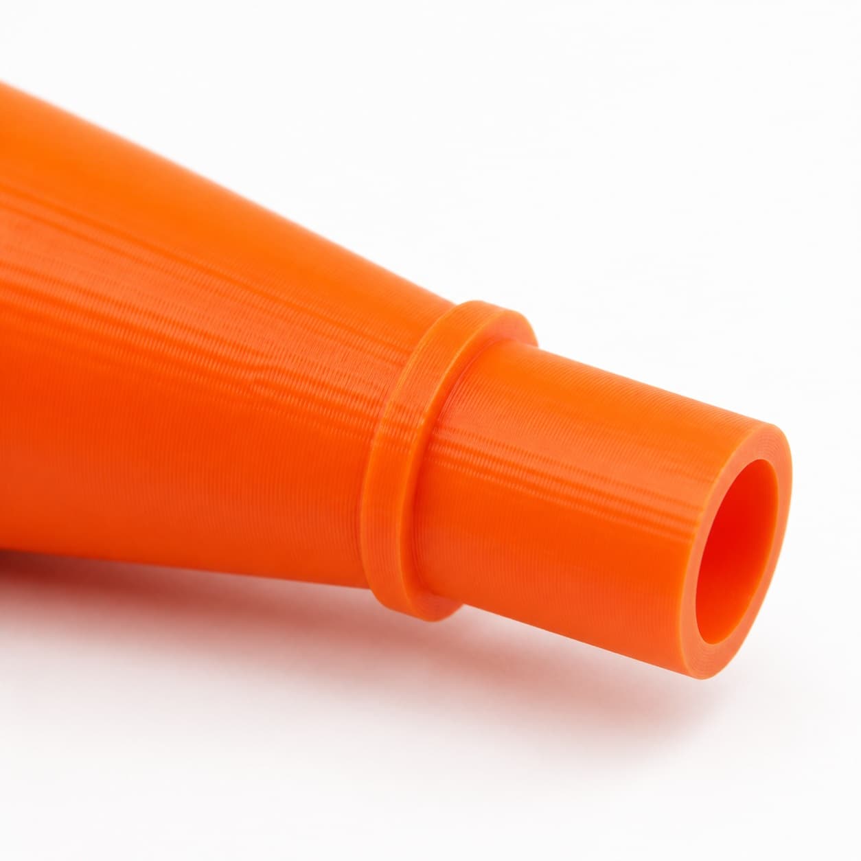 A close view of the dust adapter opening, about 57.15 mm across