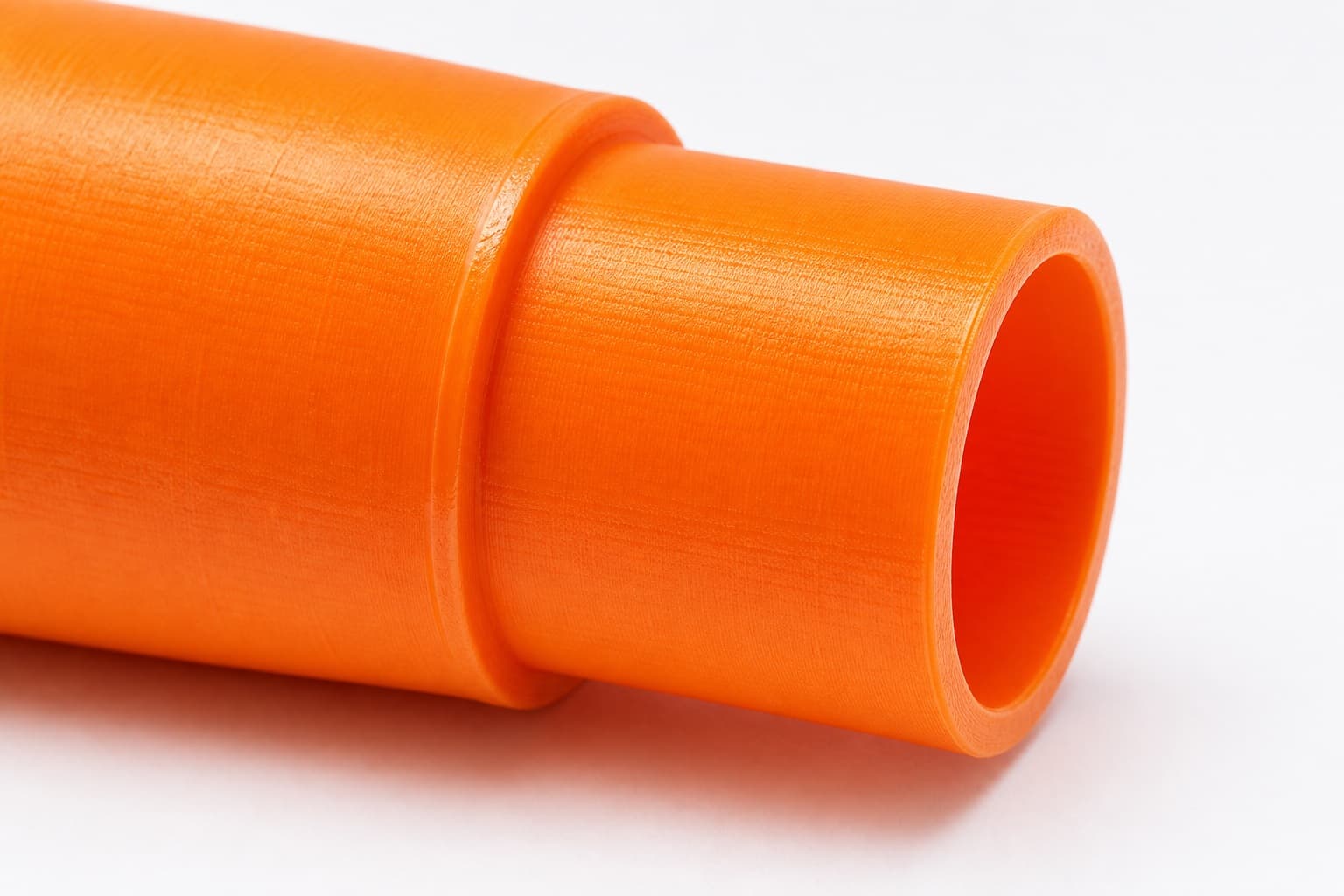 A close view of the dust adapter opening, about 27 mm across
