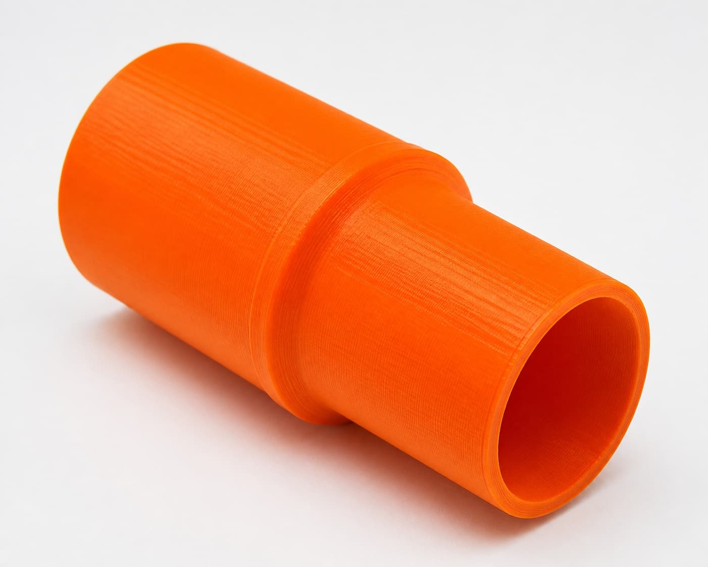 A close view of the dust adapter opening, about 35 mm across