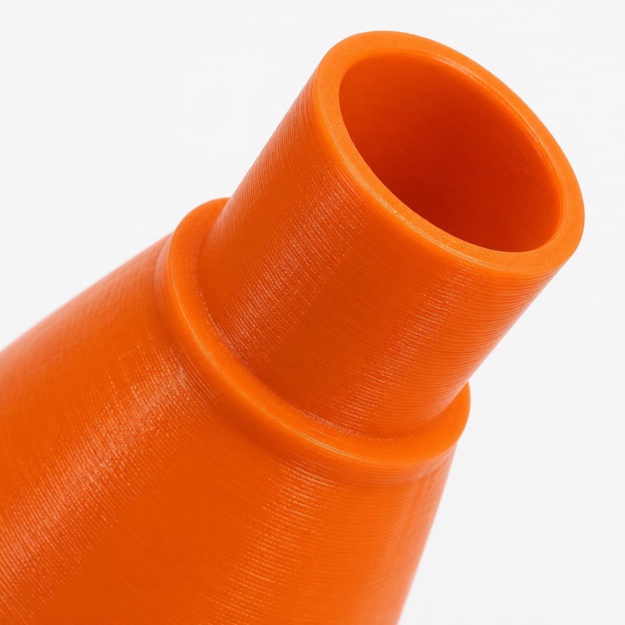 A close view of the dust adapter opening, about 36 mm across