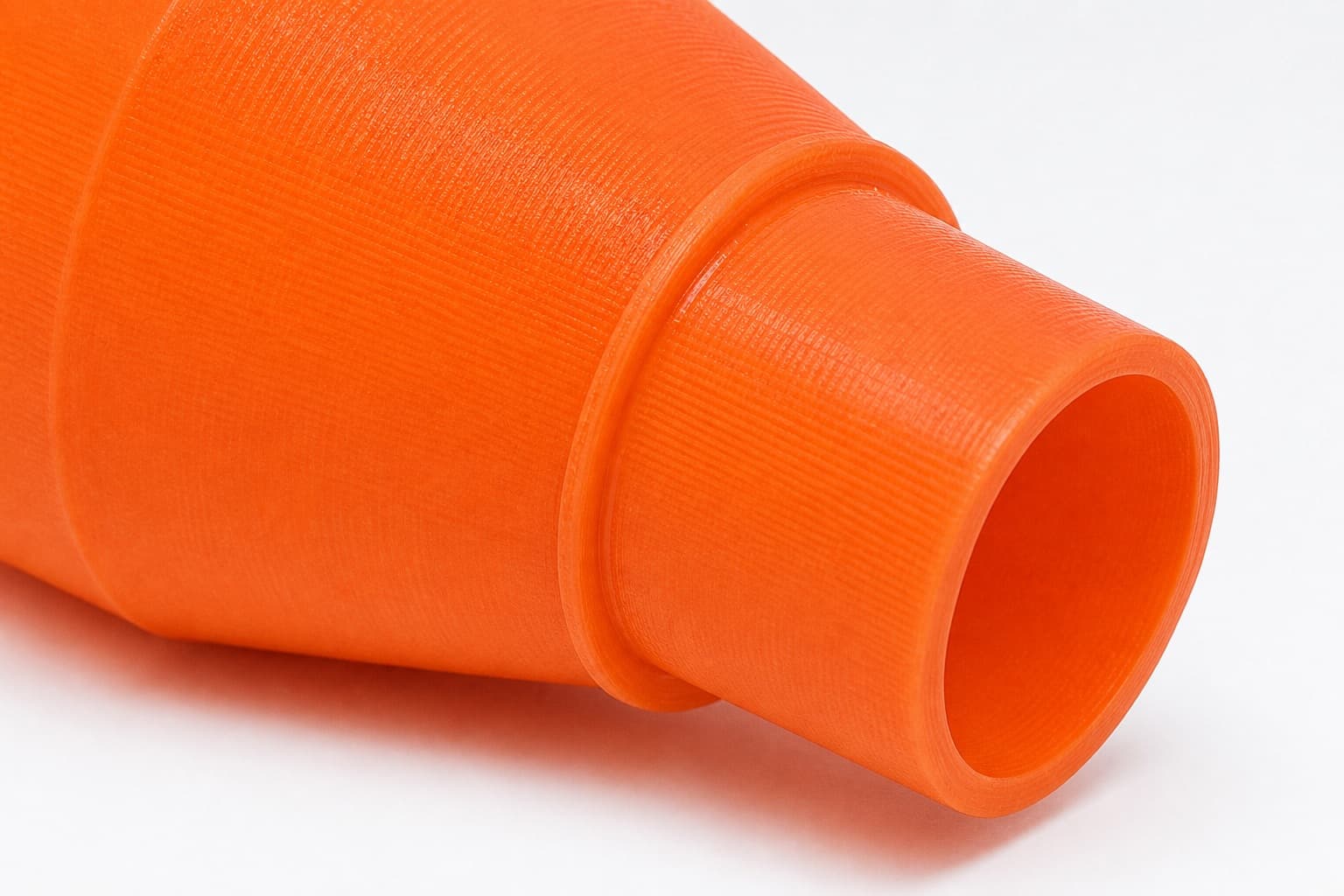 A close view of the dust adapter opening, about 47.6 mm across