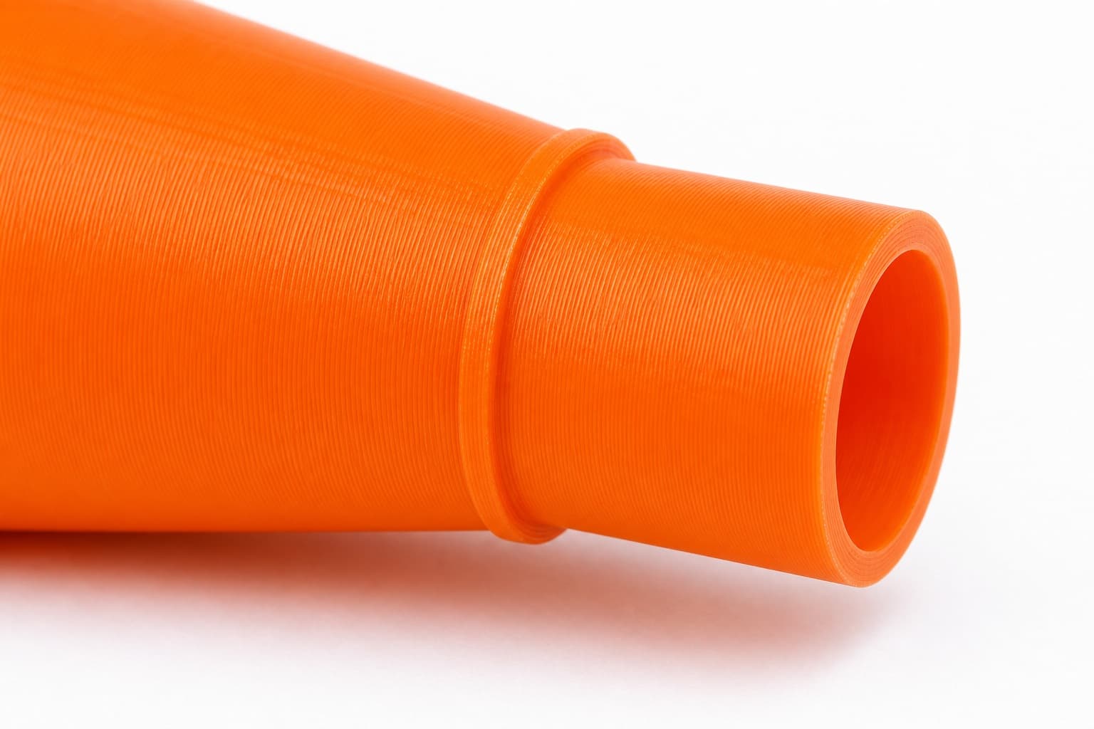 A close view of the dust adapter opening, about 57.15 mm across