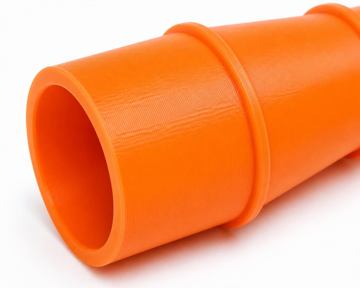 A close view of the dust adapter opening, about 25.4 mm across