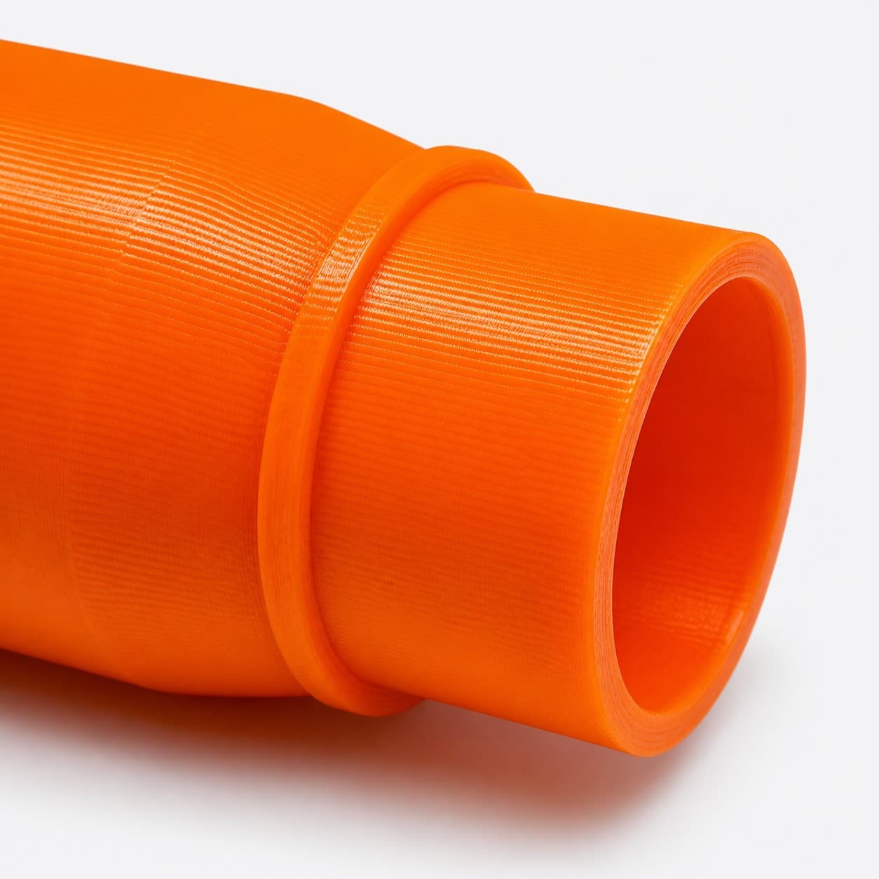 A close view of the dust adapter opening, about 27 mm across