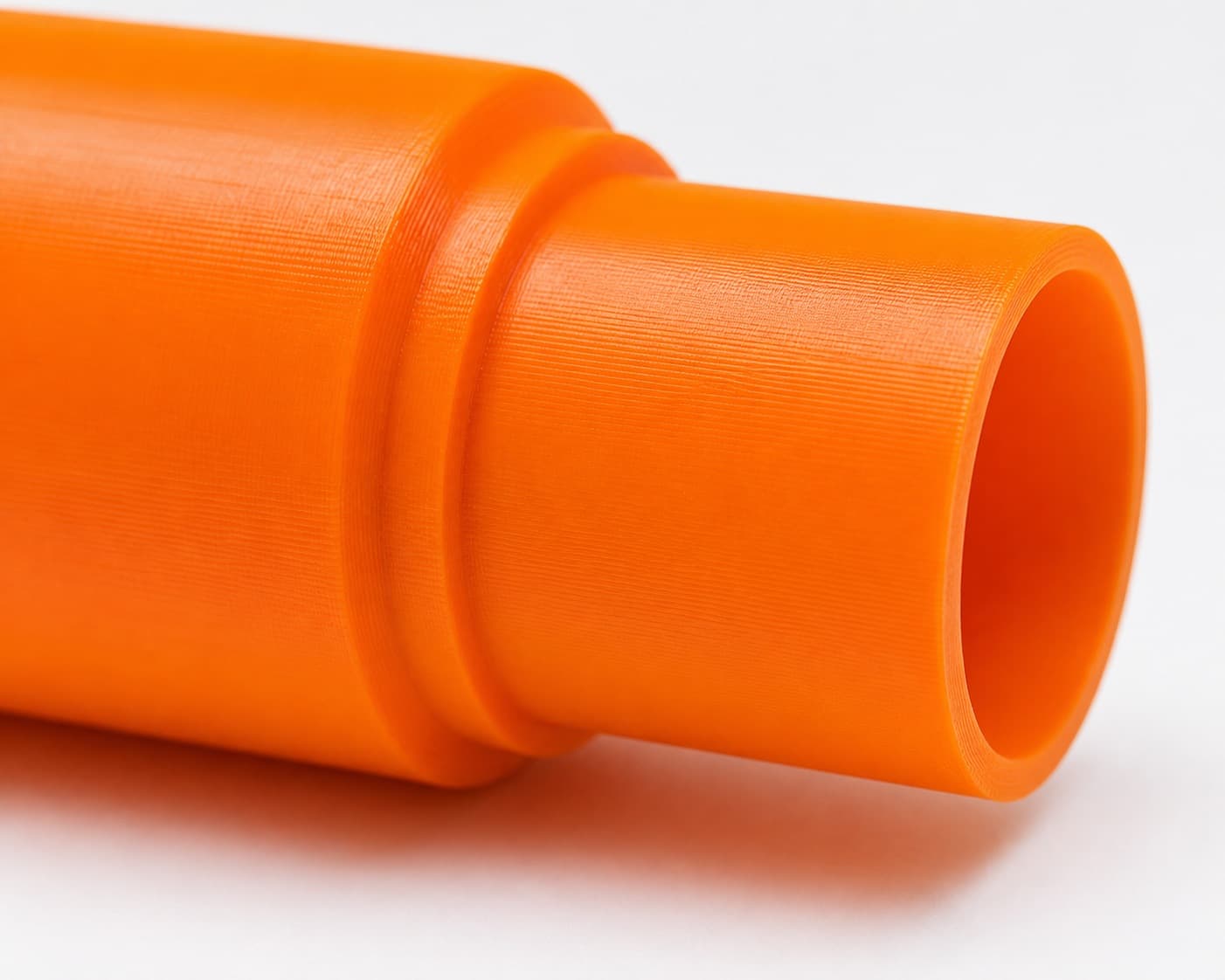 A close view of the dust adapter opening, about 31.75 mm across