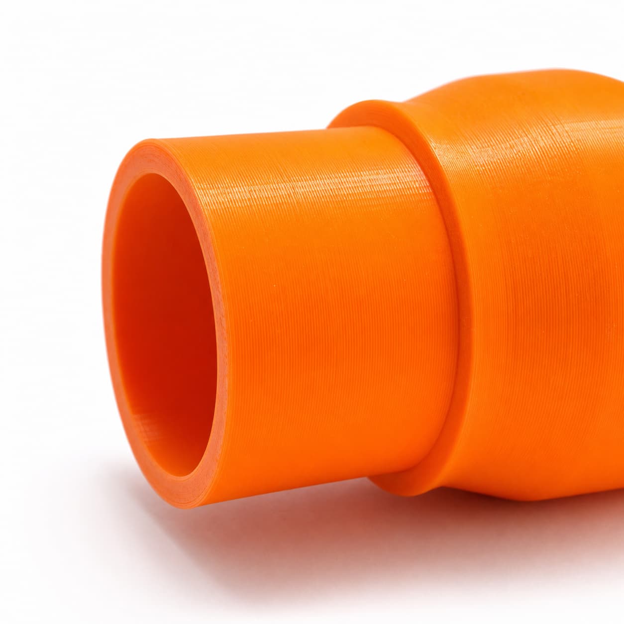 A close view of the dust adapter opening, about 35 mm across