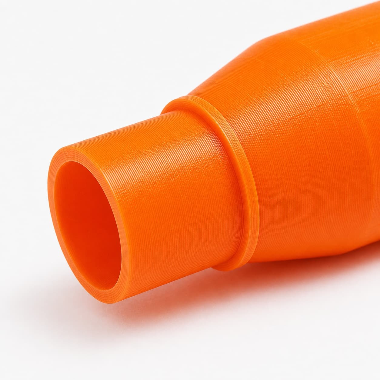 A close view of the dust adapter opening, about 38.1 mm across