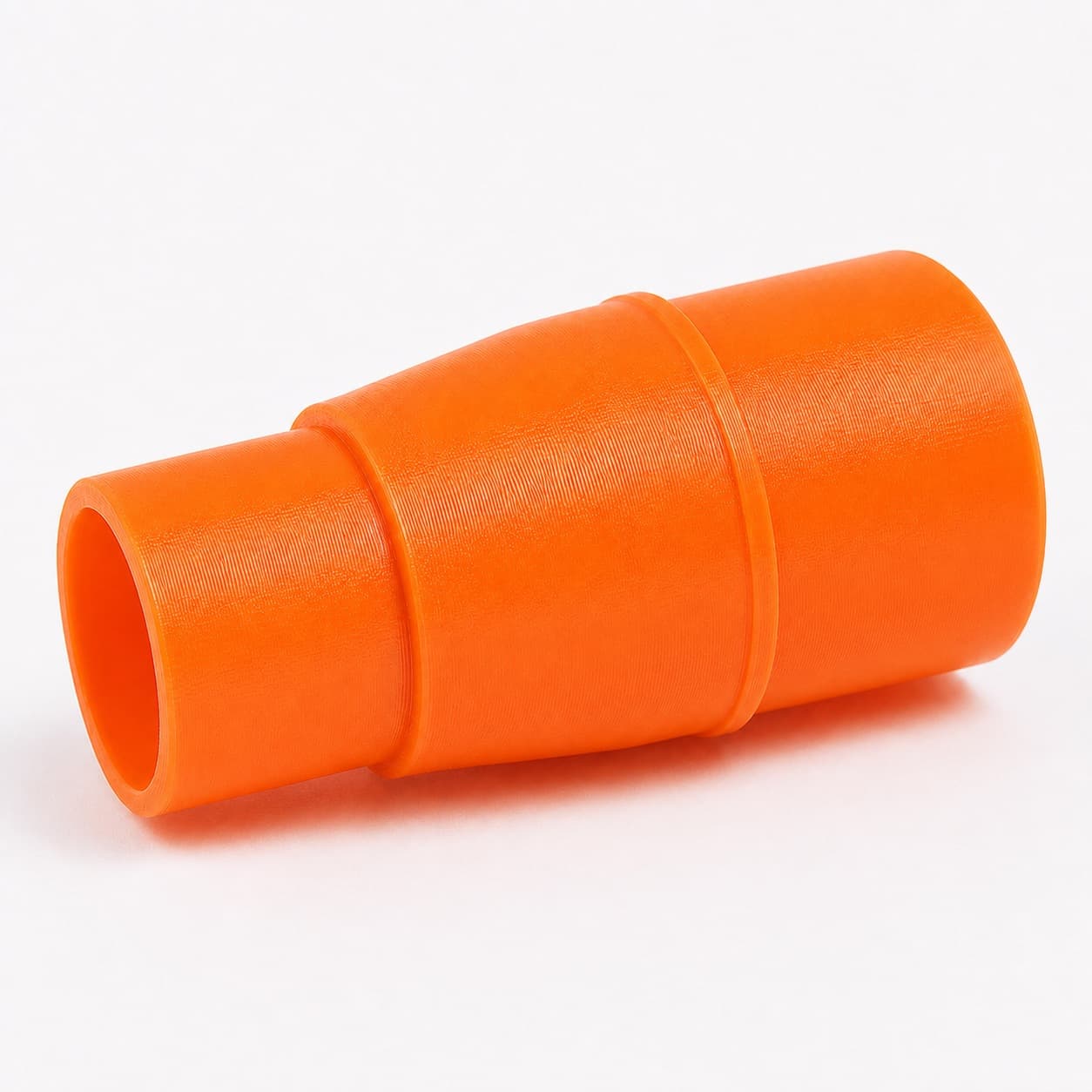 A 3D printed dust adapter that fits the Ryobi PCL505B