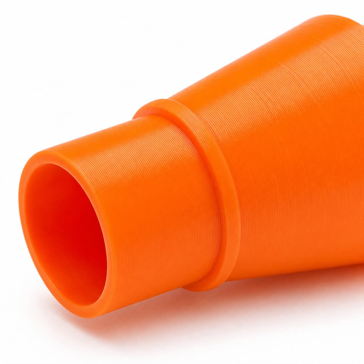 A close view of the dust adapter opening, about 57.15 mm across