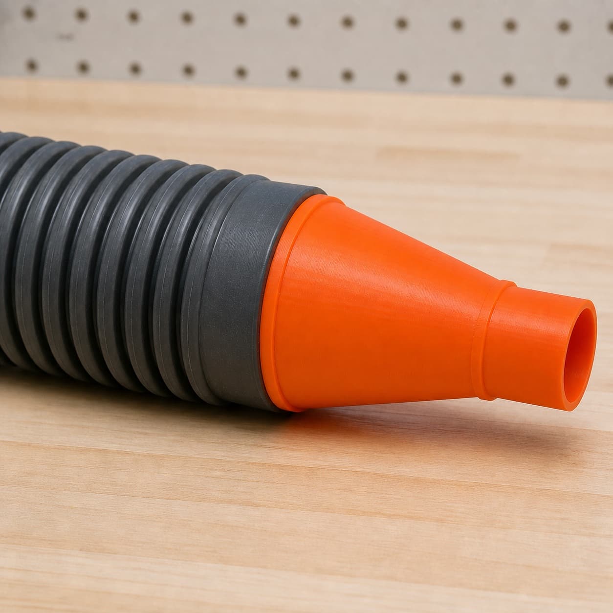 The CMCS550B dust adapter connected to a plain shop vac hose