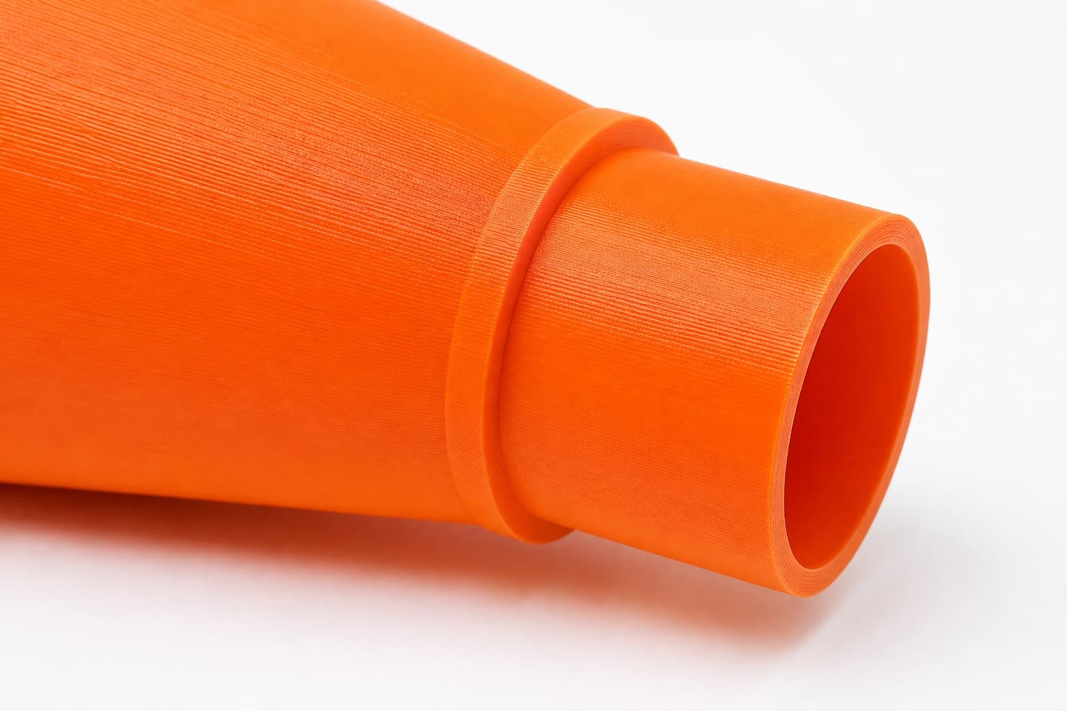 A close view of the dust adapter opening, about 76.2 mm across