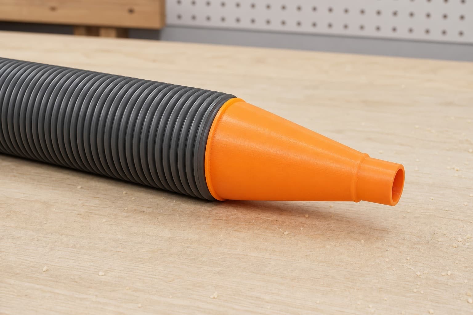 The 2737-20 dust adapter connected to a plain shop vac hose