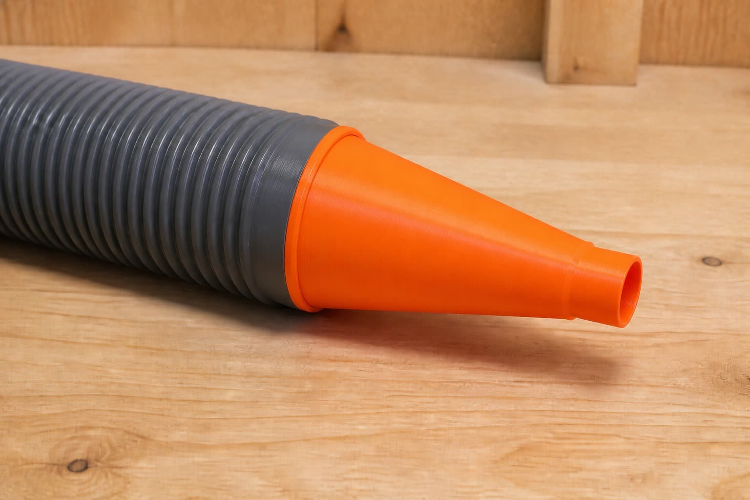 The 2737-20 dust adapter connected to a plain shop vac hose