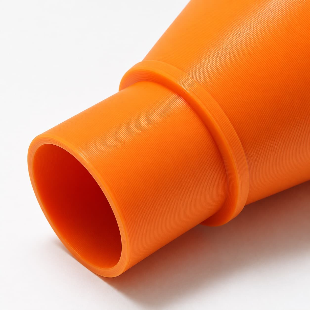 A close view of the dust adapter opening, about 47.6 mm across