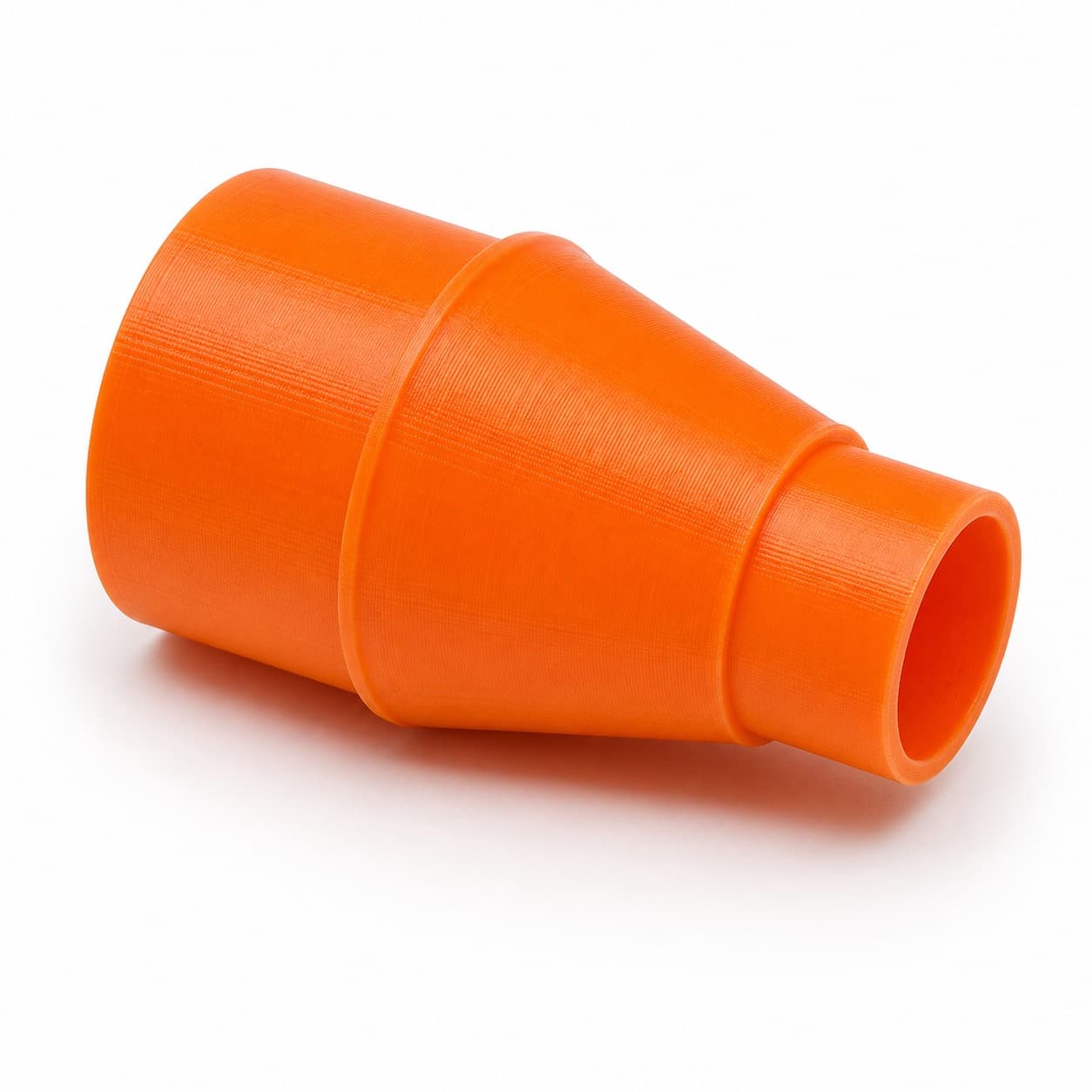 A 3D printed dust adapter that fits the Makita RT0702C