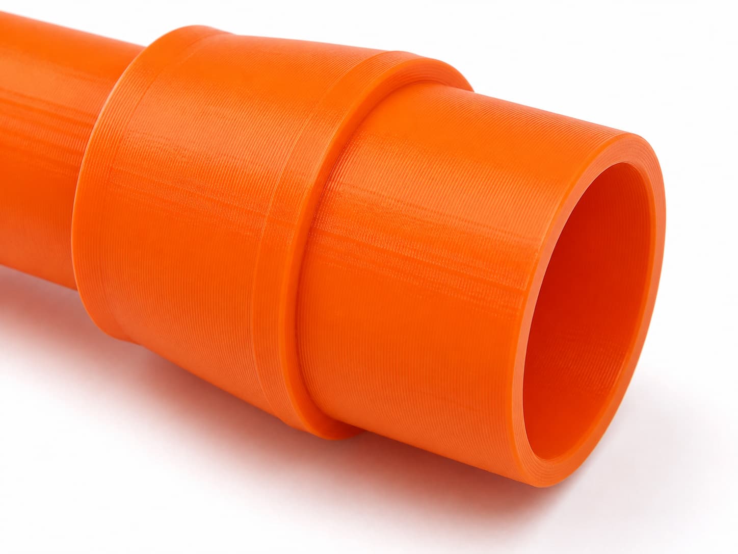 A close view of the dust adapter opening, about 27 mm across