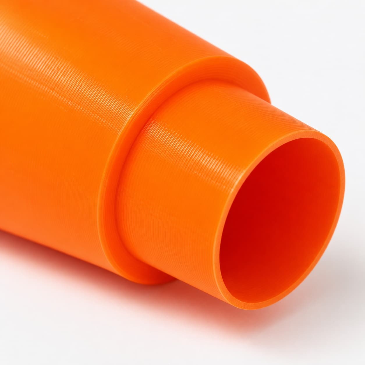 A close view of the dust adapter opening, about 25.4 mm across