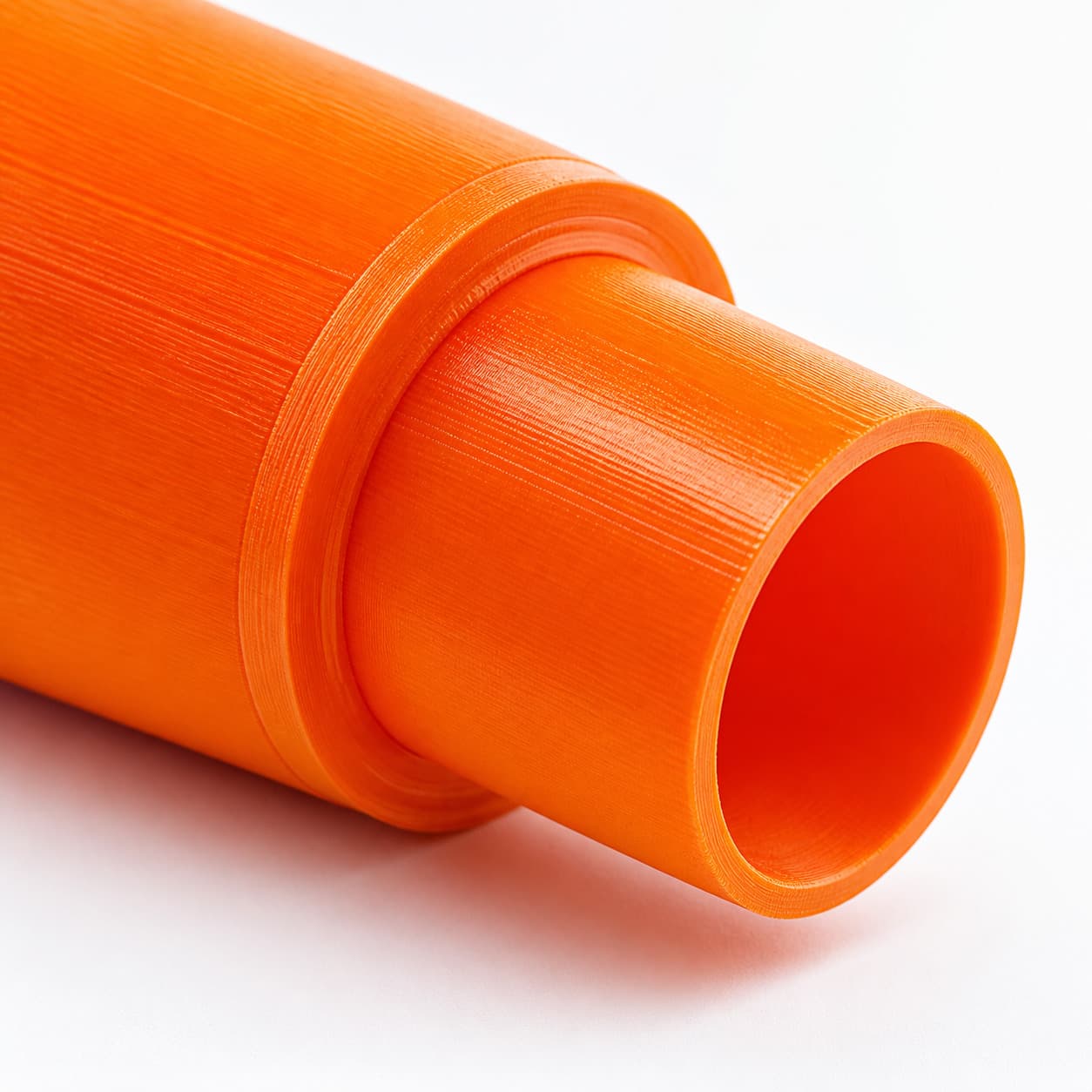 A close view of the dust adapter opening, about 31.75 mm across