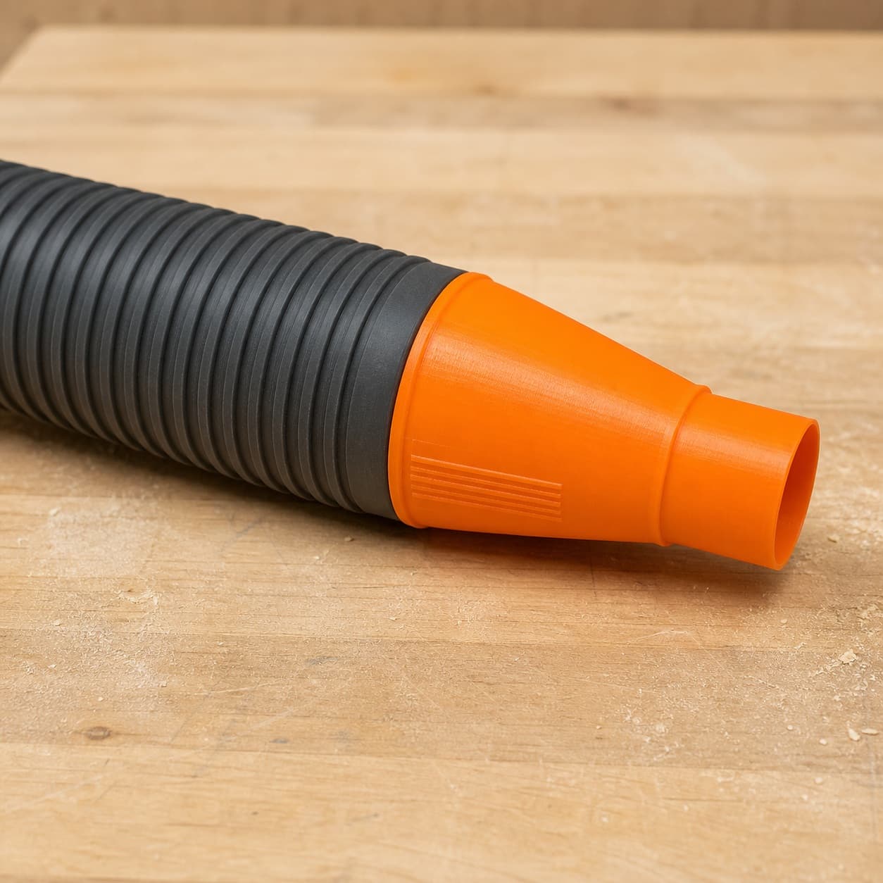 The GET75 dust adapter connected to a plain shop vac hose