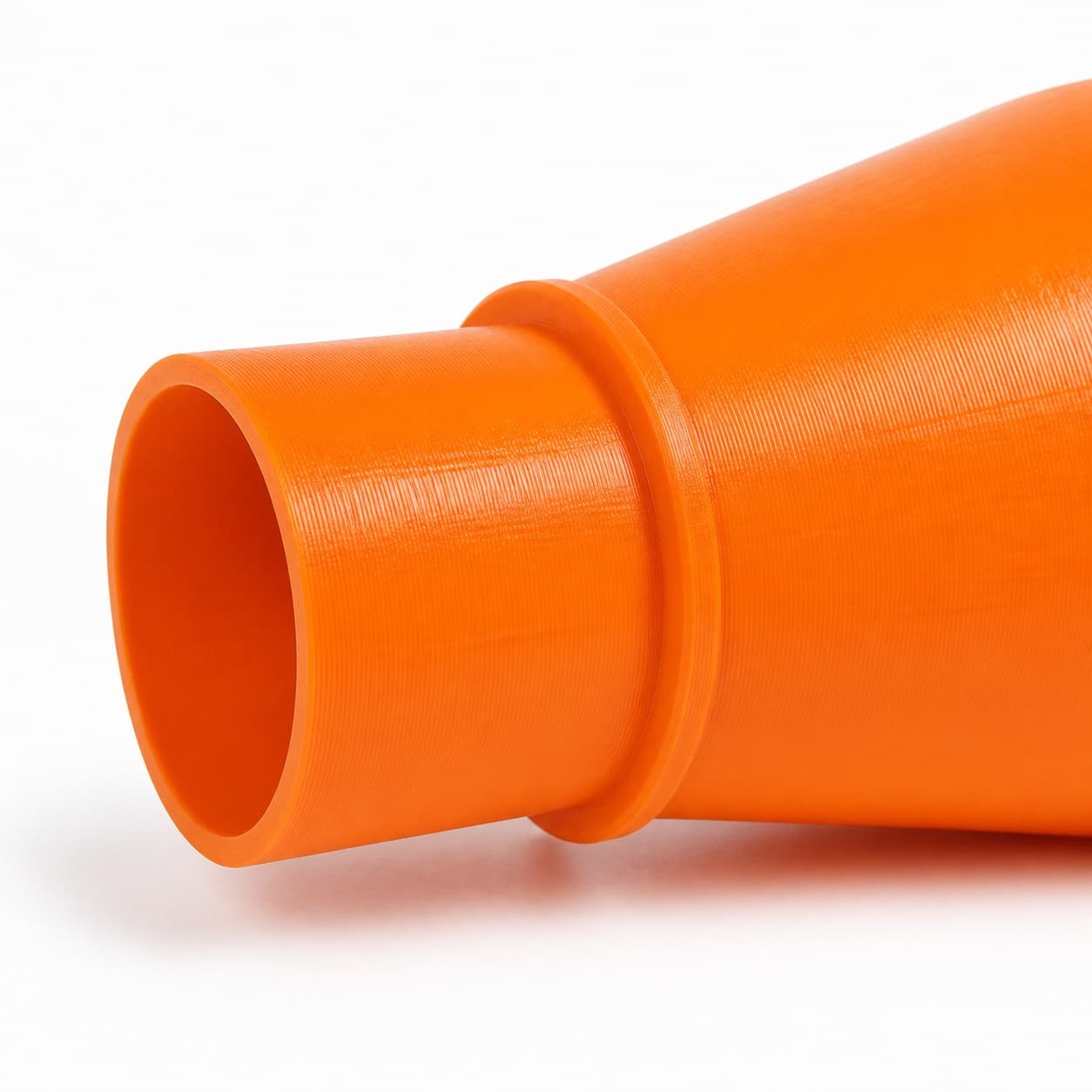 A close view of the dust adapter opening, about 76.2 mm across