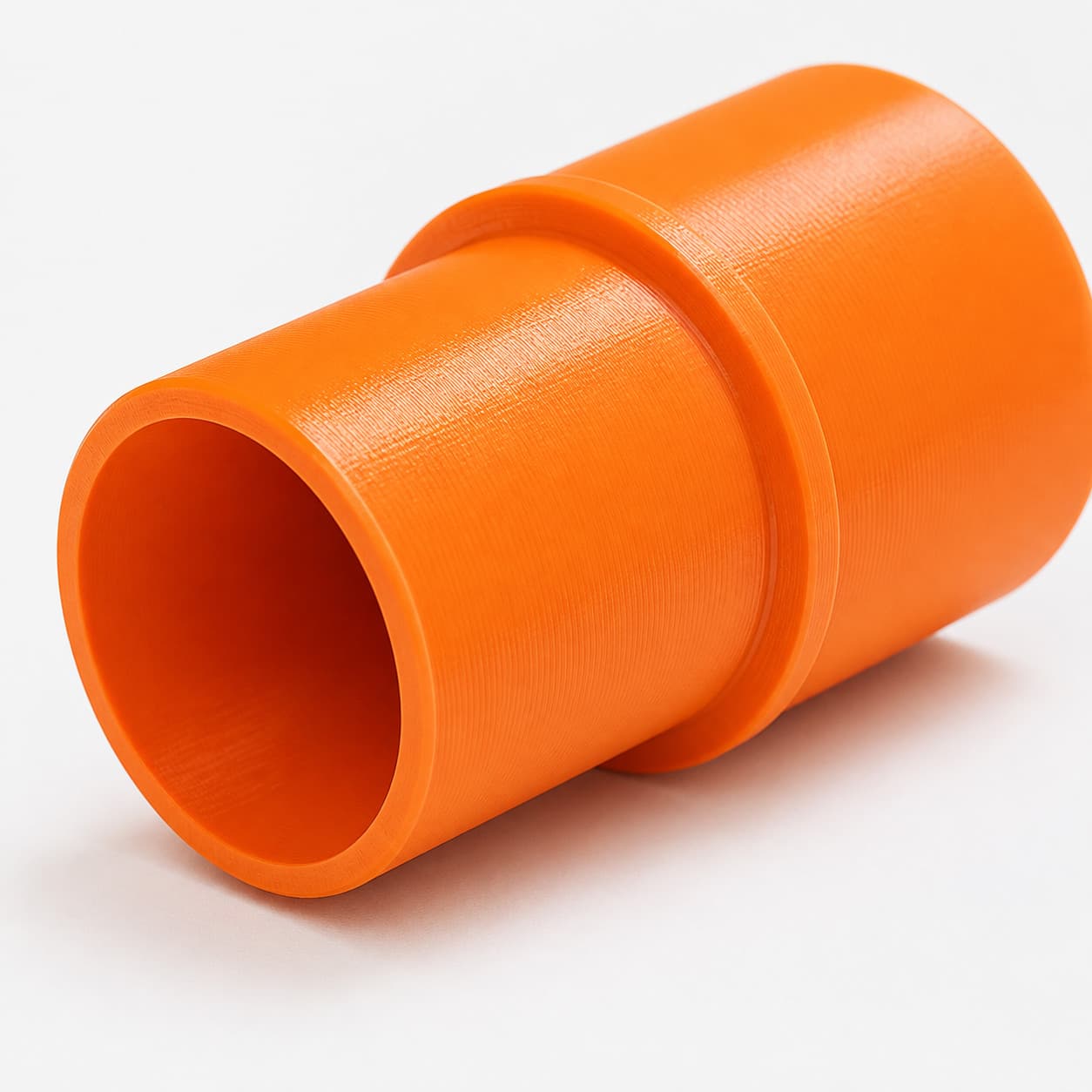 A close view of the dust adapter opening, about 36 mm across