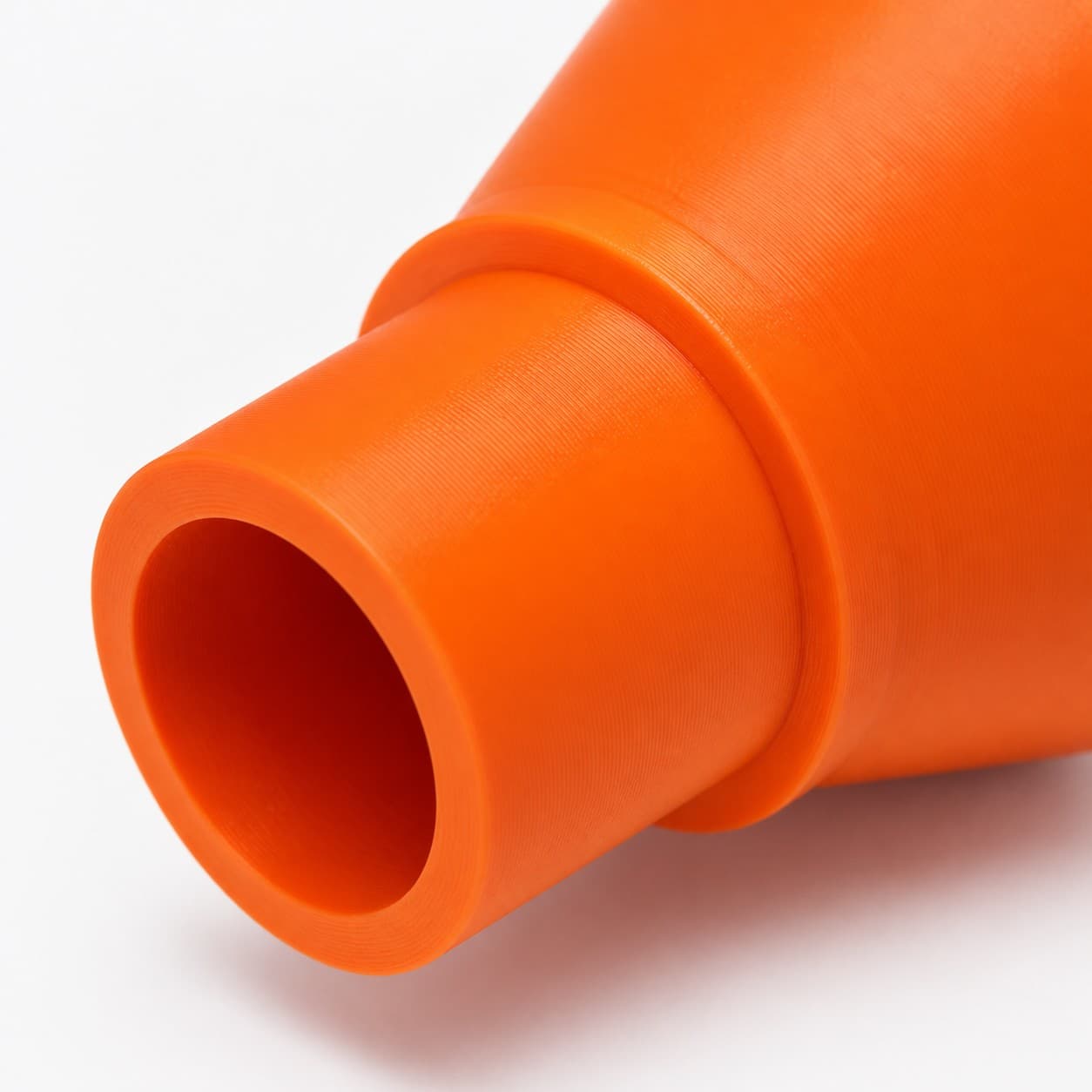 A close view of the dust adapter opening, about 47.6 mm across