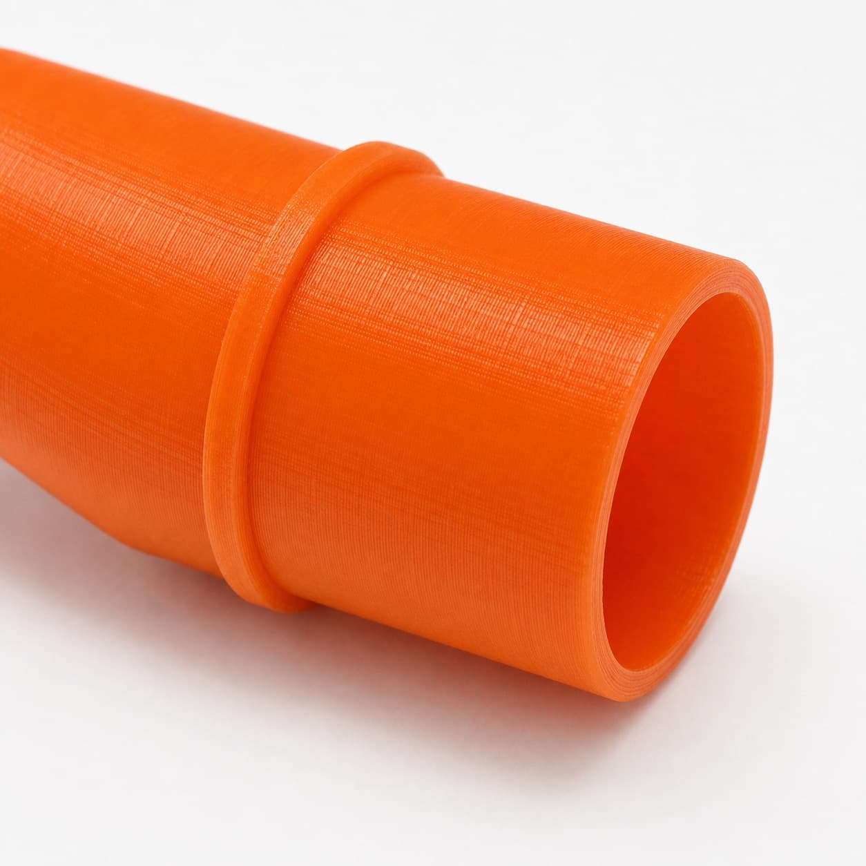 A close view of the dust adapter opening, about 27 mm across