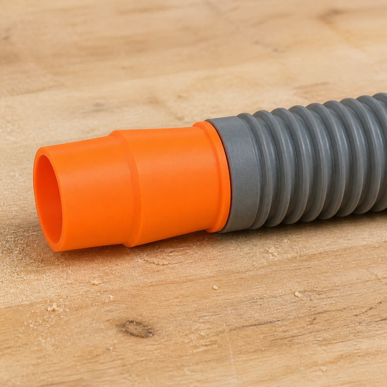 The 3386-01 dust adapter connected to a plain shop vac hose