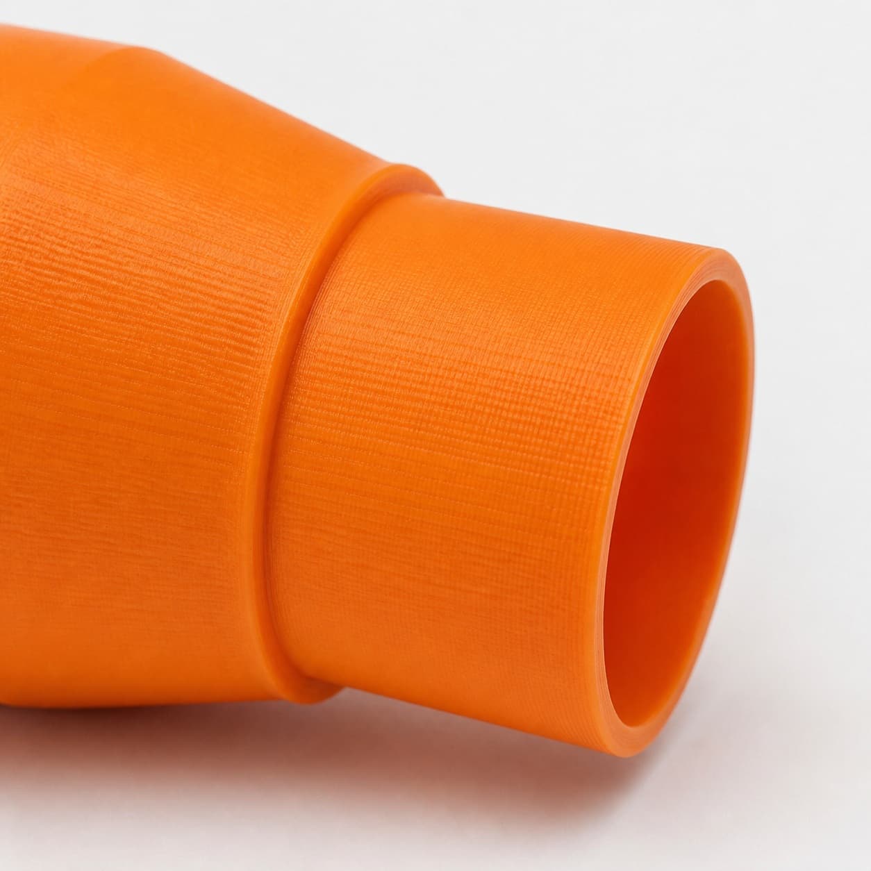 A close view of the dust adapter opening, about 47.6 mm across