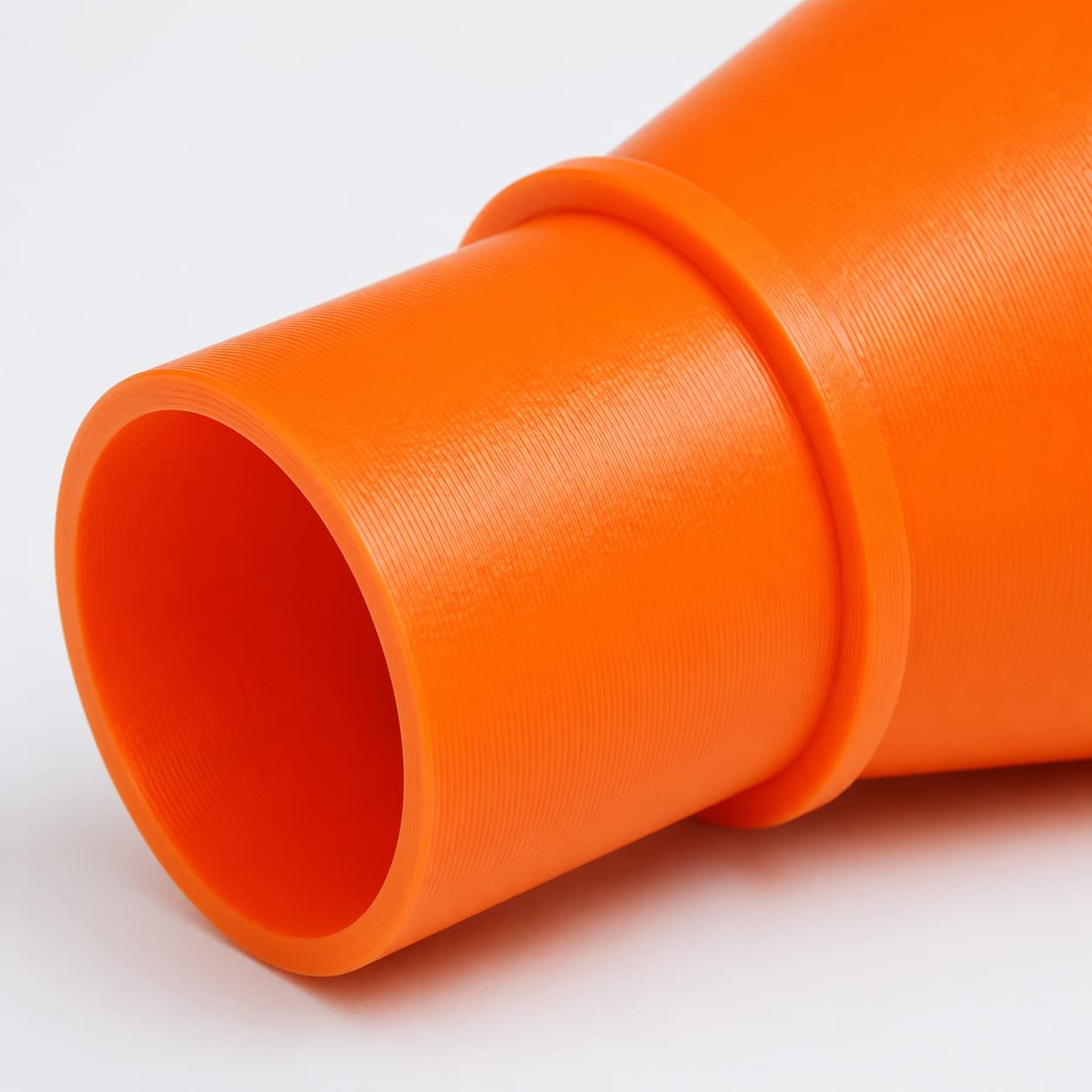 A close view of the dust adapter opening, about 57.15 mm across
