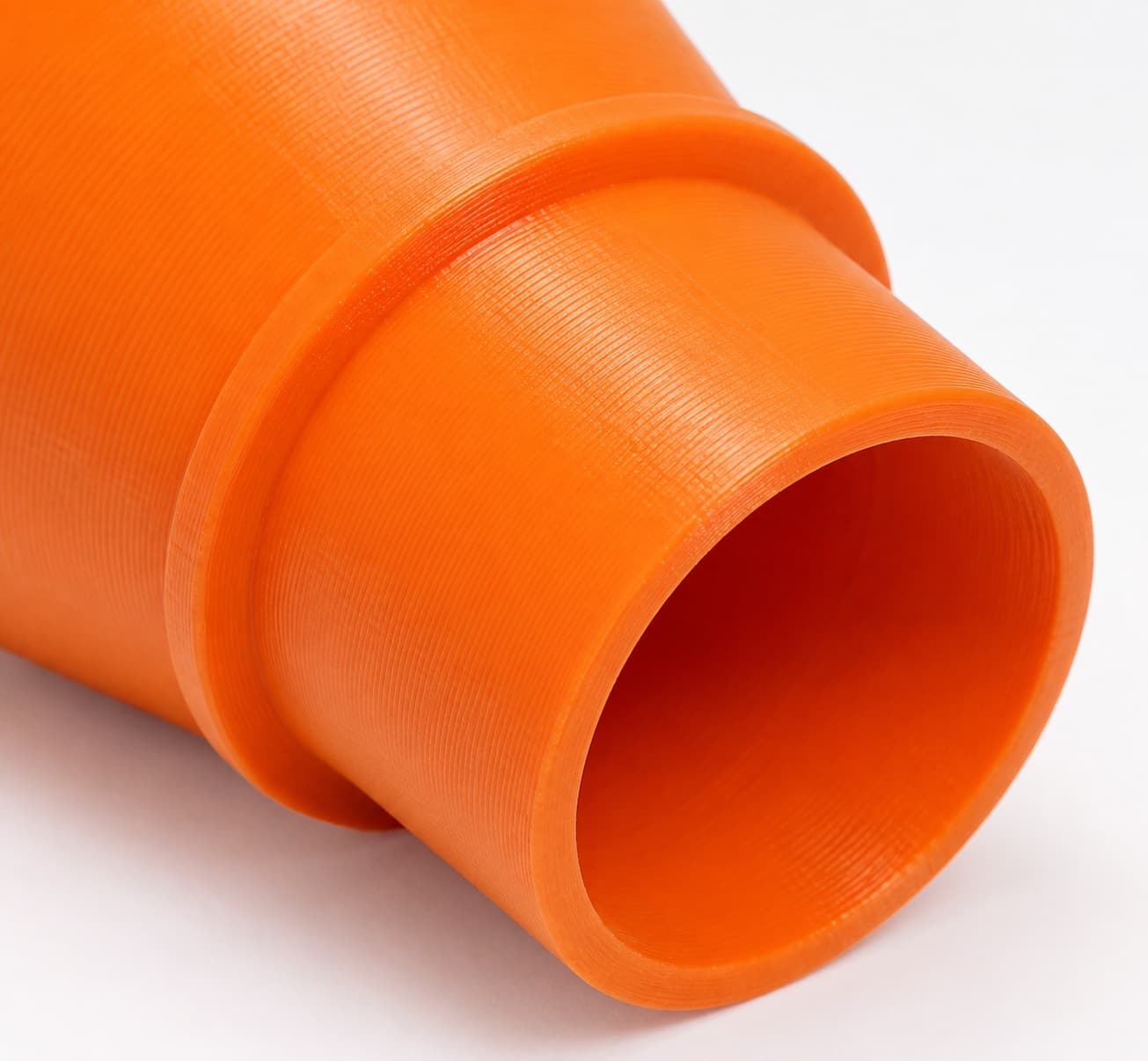 A close view of the dust adapter opening, about 47.6 mm across