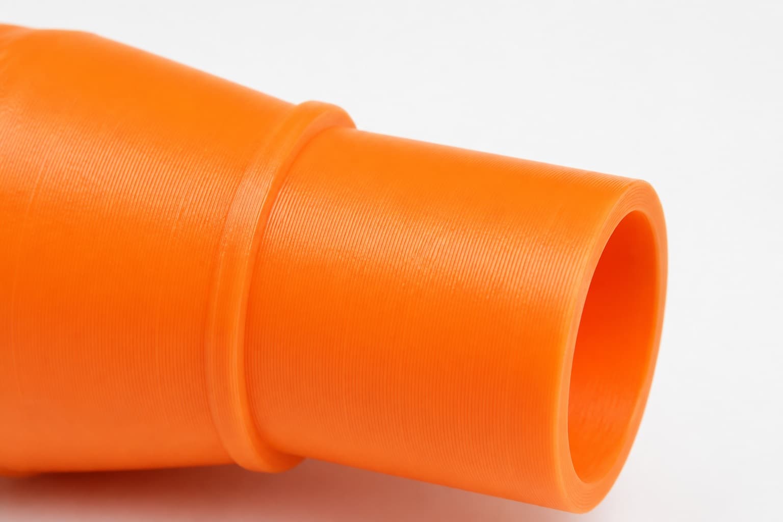 A close view of the dust adapter opening, about 57.15 mm across
