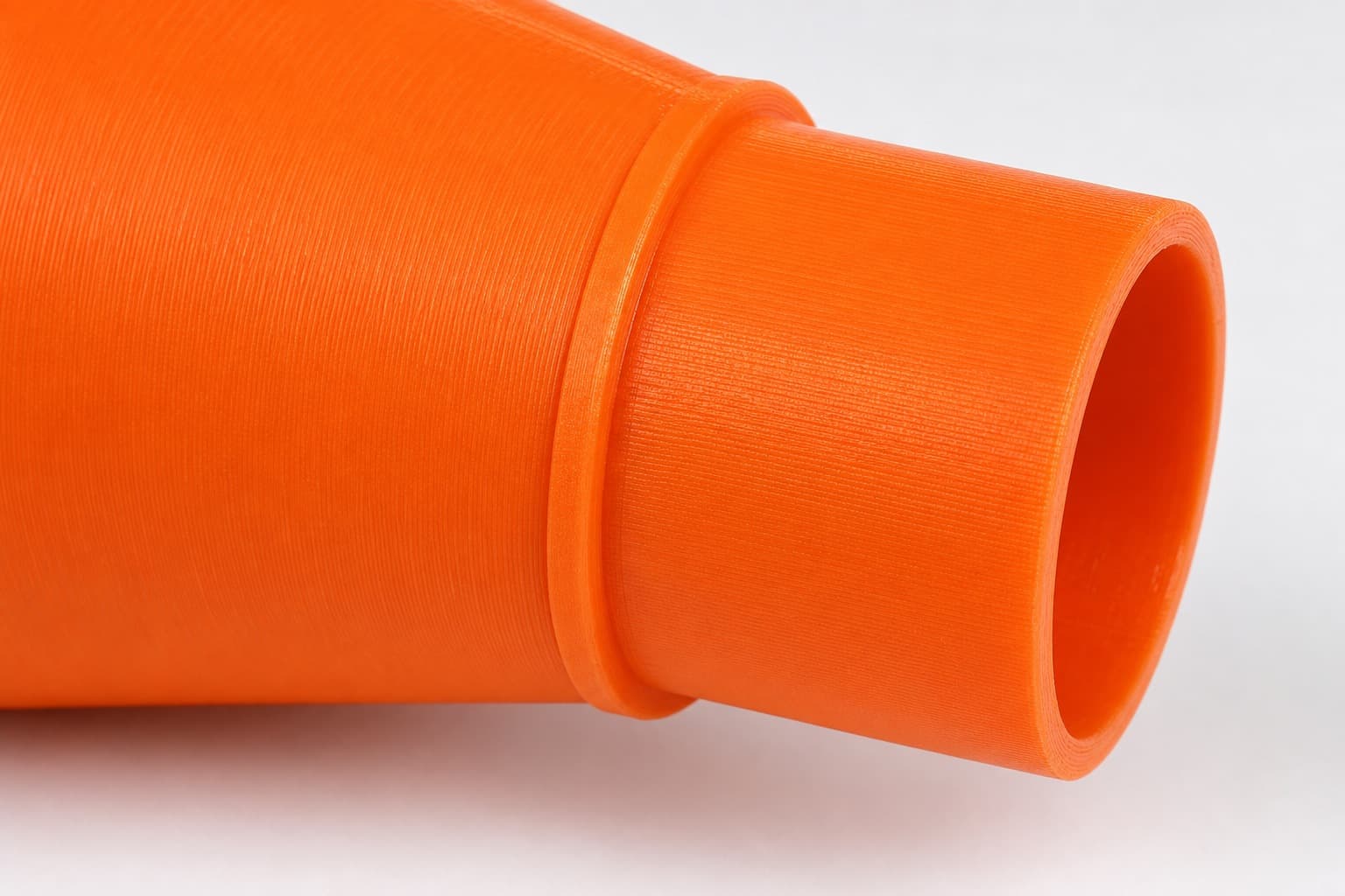 A close view of the dust adapter opening, about 27 mm across