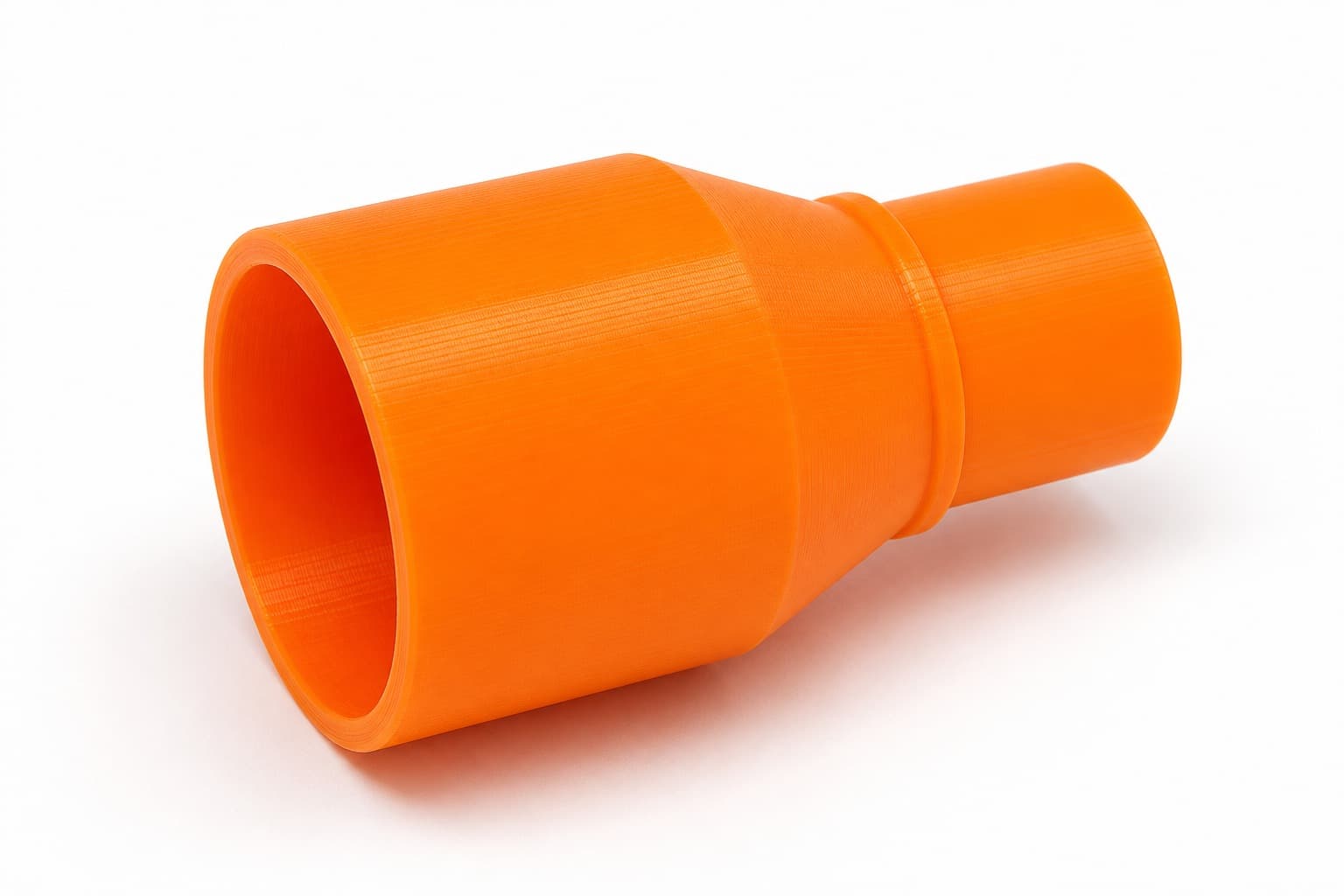 A 3D printed dust adapter that fits the Makita KP0810