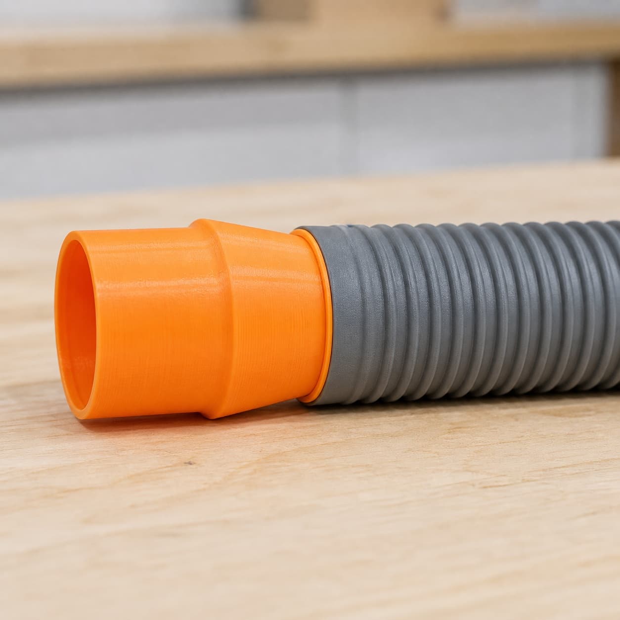 The DKP180 dust adapter connected to a plain shop vac hose