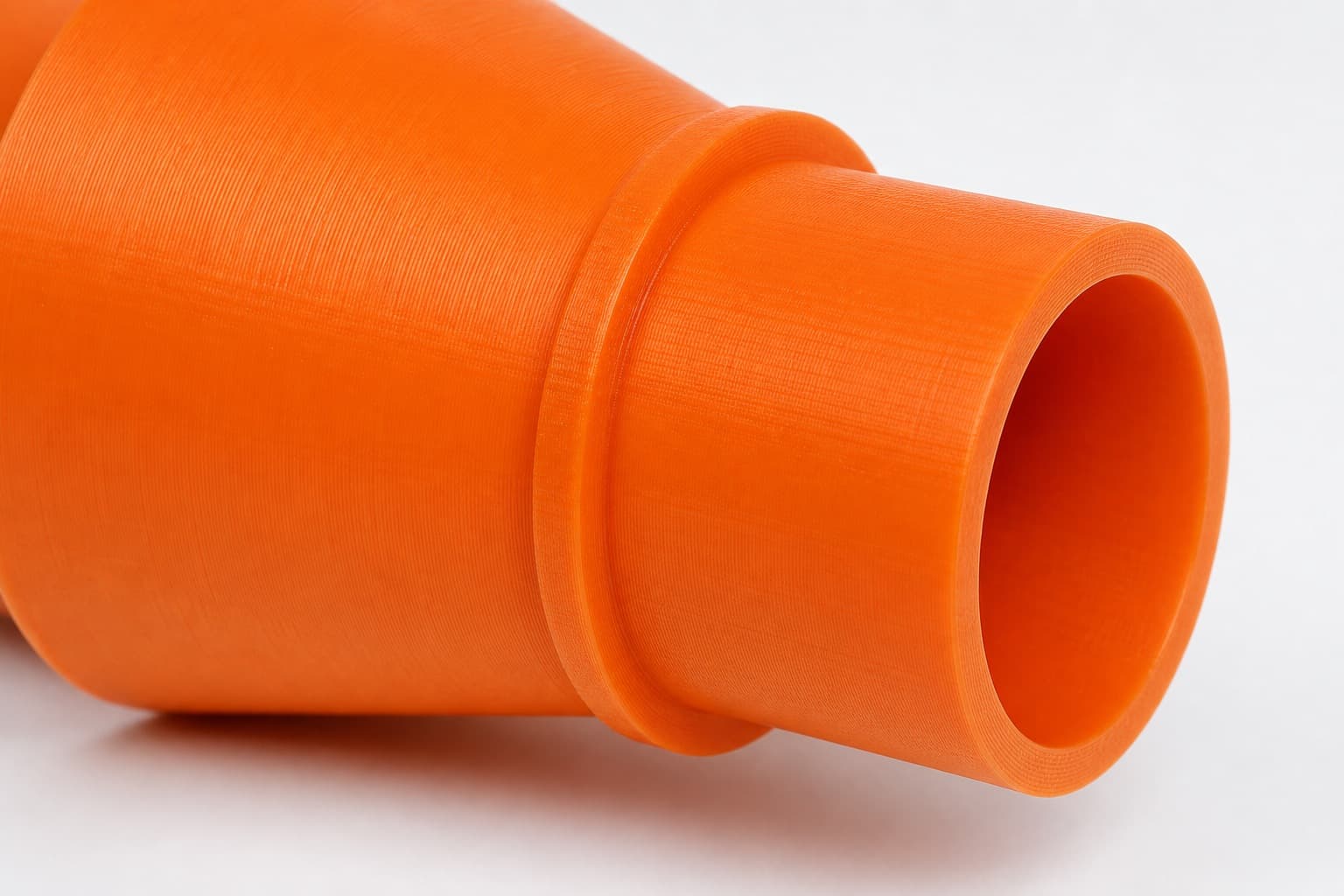 A close view of the dust adapter opening, about 35 mm across