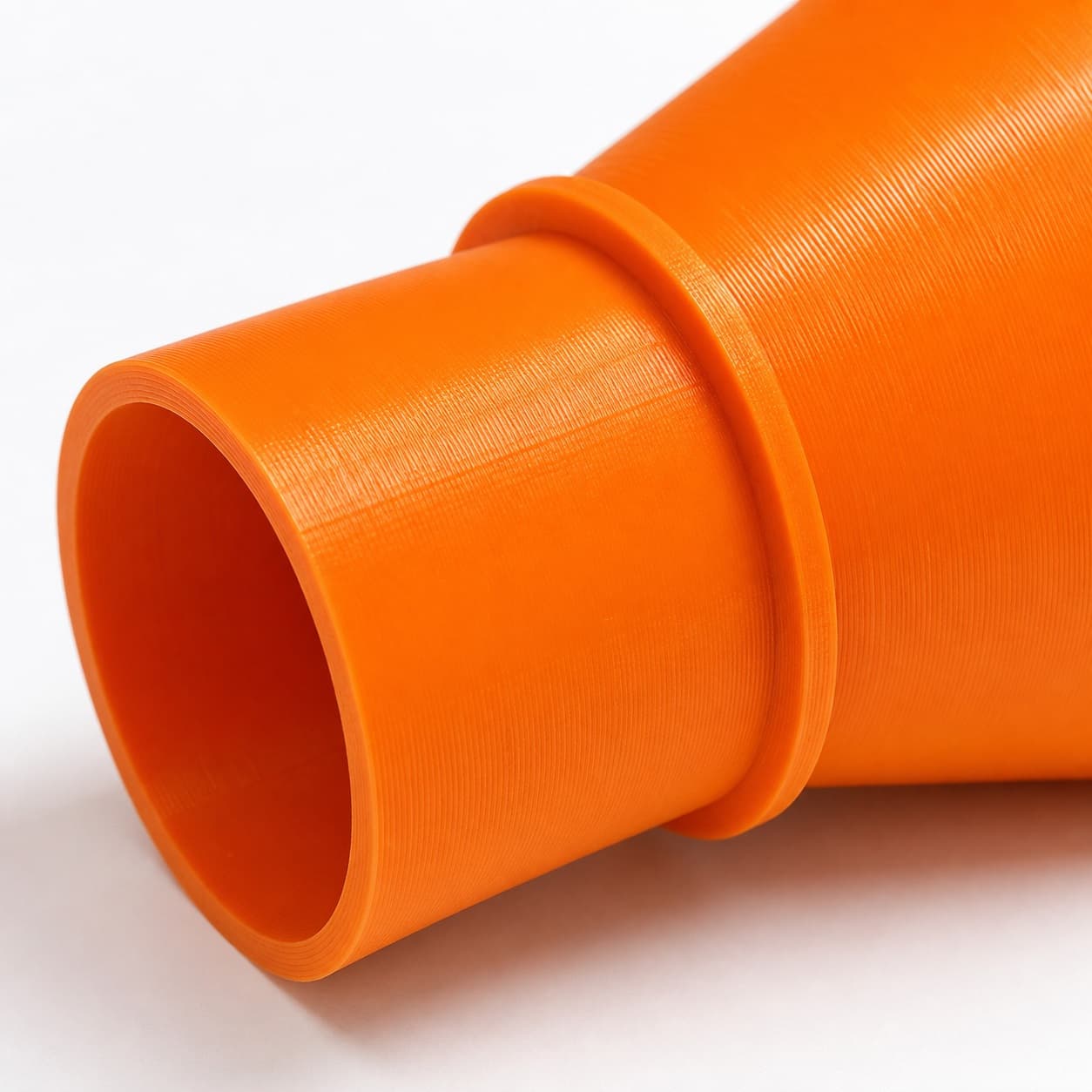 A close view of the dust adapter opening, about 36 mm across