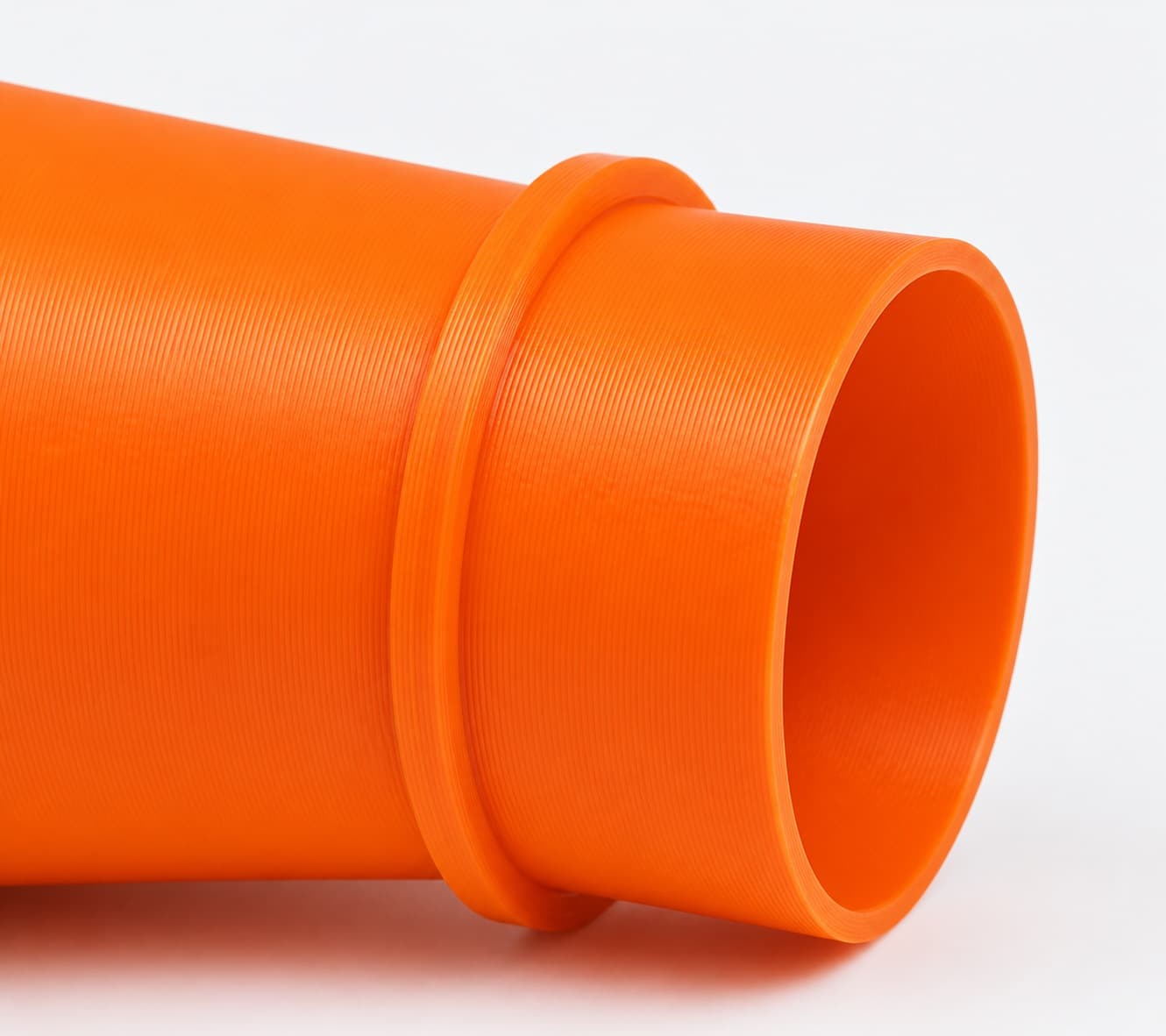 A close view of the dust adapter opening, about 57.15 mm across